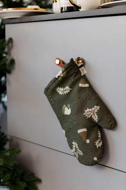 Новорічна рукавиця Шапочки на зеленому